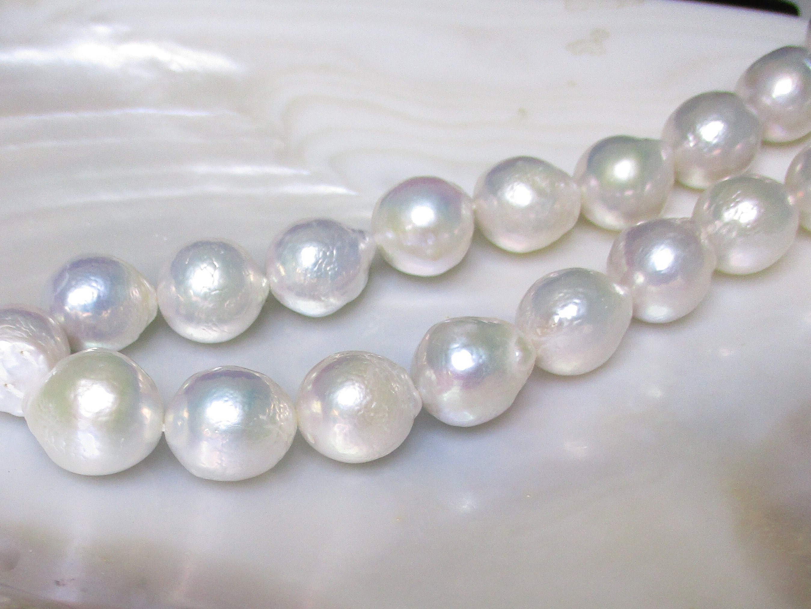 At Auction: Silver tone white faux pearl, clear and iridescent