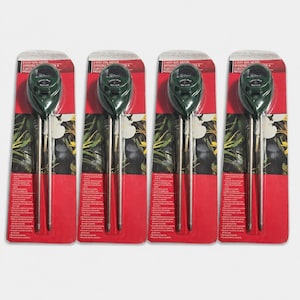 May include: Four identical three-way soil meters in original retail packaging. Each device features a dark green circular head with a gauge and two long, thin metal probes extending downward. The packaging is red with white text and floral imagery.