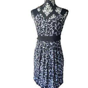 adelyn rae black lace dress Black Lace Midi Dress with Lace Up Sides Large