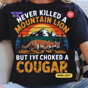 Funny Cougar Shirt PNG | Never Killed A Mountain Lion But I've Choked A Cougar | Retro Sunset Sublimation Design | Cougar Joke T-Shirt