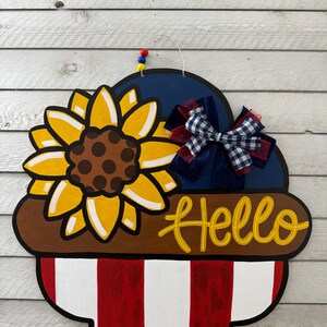 Colgador de puerta con la frase «Hello» de girasol americano