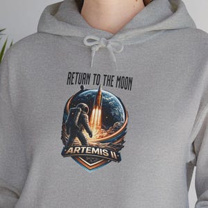 Front Print: Return to the Moon Artemis Logo Hoodie | Space Exploration Rocket Patch