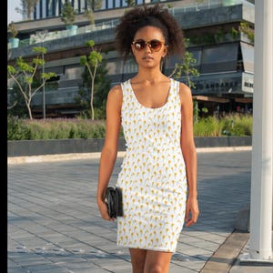 White dress, wildflower dress, daisy flower, yellow flower, bodycon dress