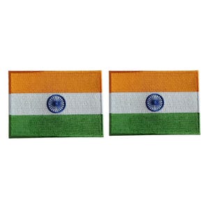 May include: Two rectangular embroidered patches featuring the national flag of India. Each patch displays horizontal bands of saffron, white, and green, with a navy blue Ashoka Chakra wheel centered on the white band of each flag.