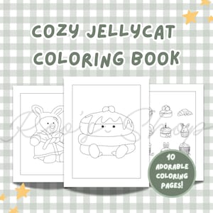 May include: A Cozy Jellycat Colouring Book with three open pages. The pages feature adorable line drawings of a bear in a bunny suit, a smiling dessert, and other cute illustrations. The cover text reads "Cozy Jellycat Colouring Book".