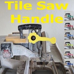 May include: A yellow tile saw handle attached to a gray and yellow tile saw. The text Tile Saw Handle is displayed in yellow at the top. A vertical column on the right shows the handle in teal, red, blue, light green, pink, and dark blue.