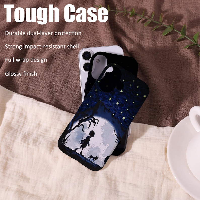 May include: A black phone case with a whimsical design featuring a silhouette of a person, a cat, and a full moon. The case has a starry night sky pattern and the text "Tough Case".