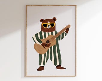 May include: A brown bear wearing green and white striped pajamas plays a brown acoustic guitar with yellow sunglasses.