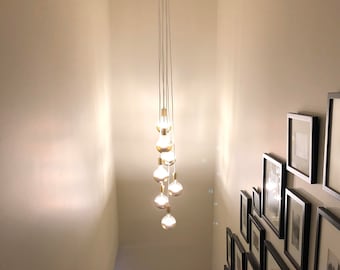 Lustre d'escalier long éclairage de foyer en cascade 7 éclairage suspendu suspendu en grappe lustre moderne cordons en tissu cuivre trempé globes LED