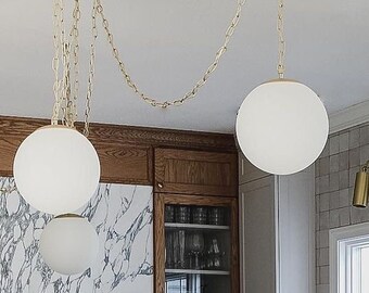 3 Pendant Custom Brass Chain Swag Chandelier With Glass Globe Shades 3 Pendant Custom Brass Chain Swag Chandelier With Glass Globe Shades