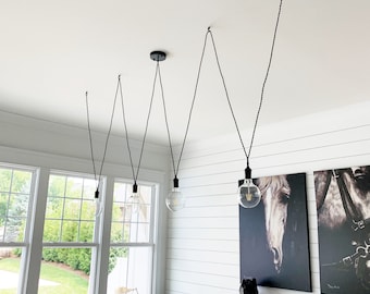 Custom Round Metal Chandelier by Hangout Lighting seen at Custom Round Metal Chandelier by Hangout Lighting seen at