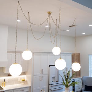 Chandelier Lighting Brass Chain - Glass Globe Shades - Modern Kitchen Lighting - Gold Necklace Chandelier - White Opal Sphere - 5 Lights