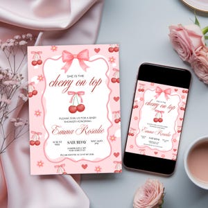 Könnte beinhalten: Rosa Babyparty-Einladung mit Kirsch-Motiv. Der Text "She is the cherry on top" ist prominent platziert, zusammen mit den Eventdetails. Ein Smartphone zeigt das gleiche Design. Kirschen, Schleifen und florale Elemente zieren die Einladung.