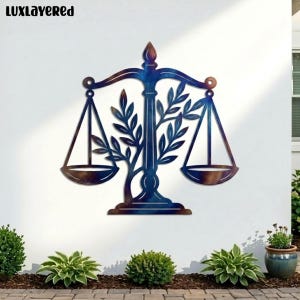 May include: A metal wall art piece depicting the scales of justice. The artwork features a balance scale design with a tree-like element in the center. The color scheme includes shades of blue and brown, with the text "LUXLAYERED" at the top.