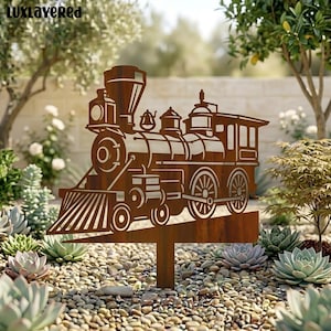 May include: A rusty brown metal train silhouette garden stake. The train features detailed cutouts of the engine, wheels, and passenger car. The stake is placed in a garden bed with small rocks and succulents.