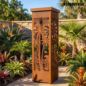 May include: A tall, rectangular, rust-colored metal garden sculpture featuring intricate laser-cut designs of palm trees, tropical foliage, and ocean waves on its side panels. The structure has a flat top and a solid base.
