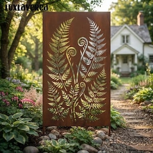 May include: A rectangular metal garden screen with a rusted brown finish featuring a laser-cut design of three fern fronds. The intricate foliage pattern is displayed in a vertical orientation, showcasing detailed leaf structures and curled tips.