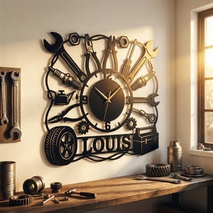 May include: A black wall clock featuring a central circular face with gold hands and numbers 3, 6, 9, and 12. The frame is decorated with silhouettes of automotive tools, a tyre, a toolbox, and the name LOUIS in bold capital letters.