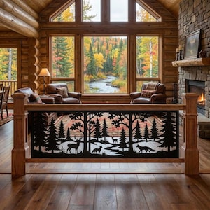 May include: A black metal railing insert featuring a laser-cut forest scene with silhouettes of pine trees, a deer, and a fox. The rectangular panel is framed by light brown wooden posts and a top rail, set against a rustic log cabin interior.