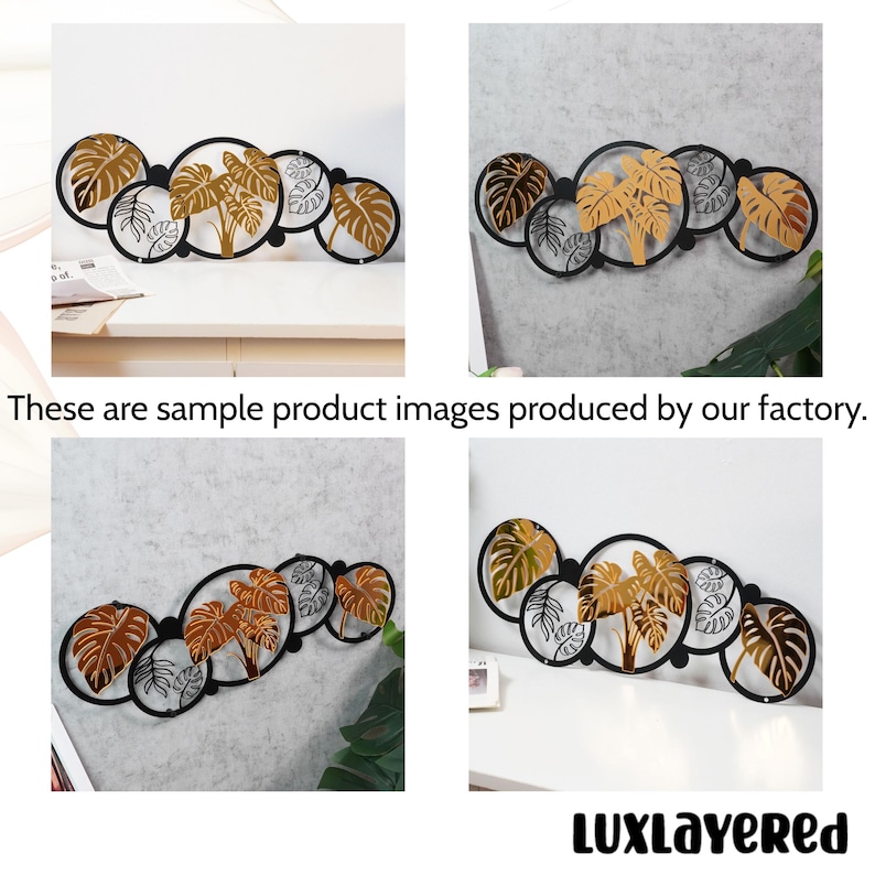 Pu&ograve; includere: Arte da parete in metallo decorativo con una serie di cerchi neri interconnessi con disegni di foglie tropicali dorate e argentate. Il testo "These are sample product images produced by our factory" &egrave; visibile.