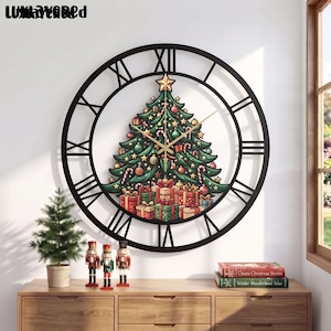 May include: A large circular black metal wall clock with Roman numerals. The center features a colorful illustration of a decorated Christmas tree with gold stars, ornaments, candy canes, and a pile of wrapped gift boxes at the base.