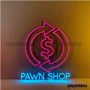 May include: A neon sign with a pink dollar sign inside a circular arrow design, with the words "PAWN SHOP" in blue neon below. The sign is against a neutral background.