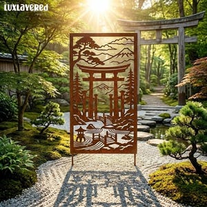 May include: A rectangular metal garden screen featuring a laser-cut design of a torii gate, a bridge, a stone lantern, and a mountain landscape. The brown, weathered-look panel stands upright, displaying intricate silhouettes of trees and clouds.