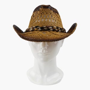 May include: A brown straw cowboy hat featuring an open-weave construction with a darker brown gradient at the crown and brim edges. The hat is accented with a braided band in shades of brown, tan, and cream, encircling the base of the crown.