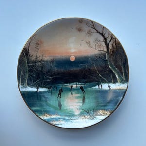 Coalport Skating at Sunset by Neils Christiansen plate in box