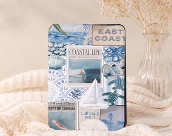 May include: A rectangular tablet case featuring a blue and white coastal-themed collage. The design includes images of a surfer, a sailboat, sea turtles, oysters, and text reading "COASTAL LIFE," "EAST COAST," "THE COASTAL TIMES," and "LOCALS ONLY."