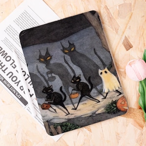 May include: Halloween-themed decorative tray featuring a spooky scene with black cats, a ghost, and a jack-o'-lantern. The cats are carrying treat bags, and the background has a dark, shadowy atmosphere. The tray is rectangular.