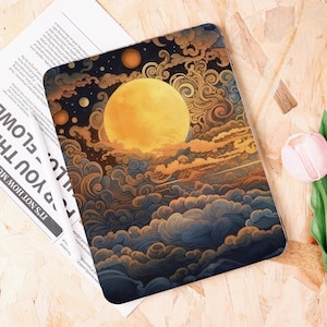 May include: A rectangular decorative item featuring a celestial design. The artwork depicts a large yellow moon, clouds, and stars in shades of blue, orange, and gold. The item has rounded corners and a glossy finish.