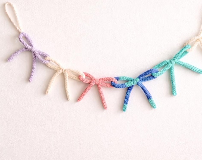 Featured listing image: Handmade Icord Bow Garland, Nursery Decor, Baby Shower Gift, Cotton Yarn Garland