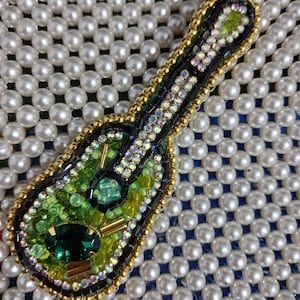 brooch for coat,a guitar brooch to be worn on the heart.