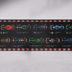 May include: A framed print featuring top-down views of ten Formula 1 race cars. The cars are arranged in two rows on a black background, each with a unique color scheme. The frame has a checkered flag design on the left side and a red and white striped border.