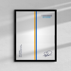 May include: Framed print featuring a white background with vertical stripes in orange and blue. The print includes text and a signature in the lower left and right corners. The frame is black.