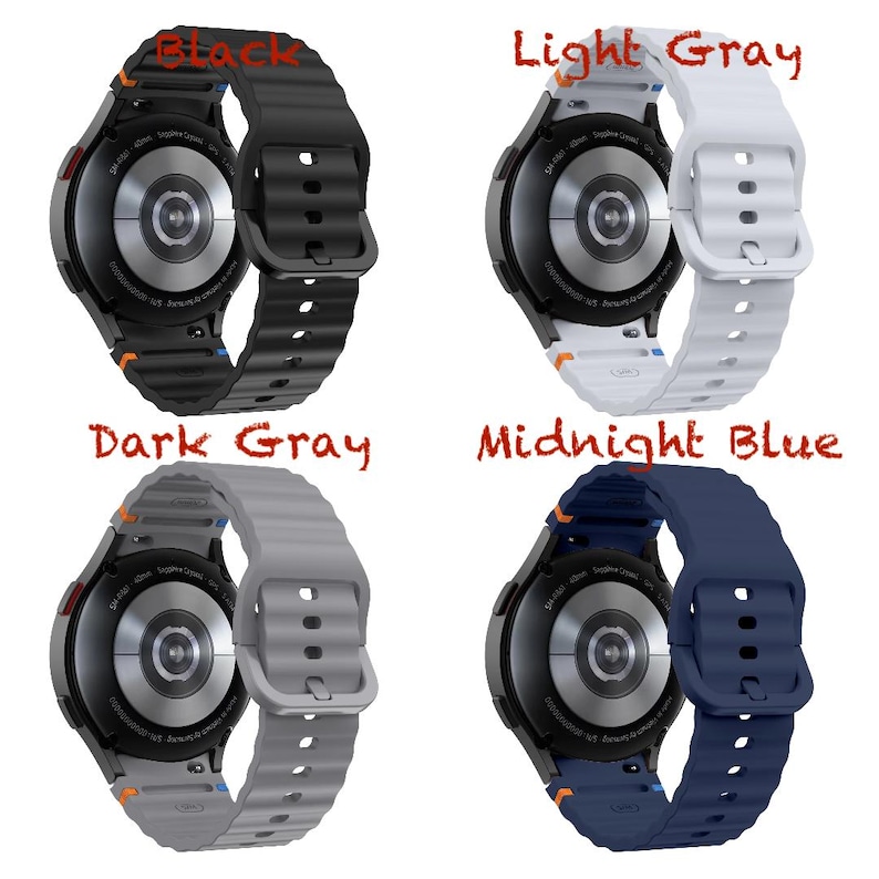 May include: Four smartwatches in black, light grey, dark grey, and midnight blue. Each watch has a round face and a silicone strap. The watch faces are black with silver detailing. The straps have a ribbed texture.