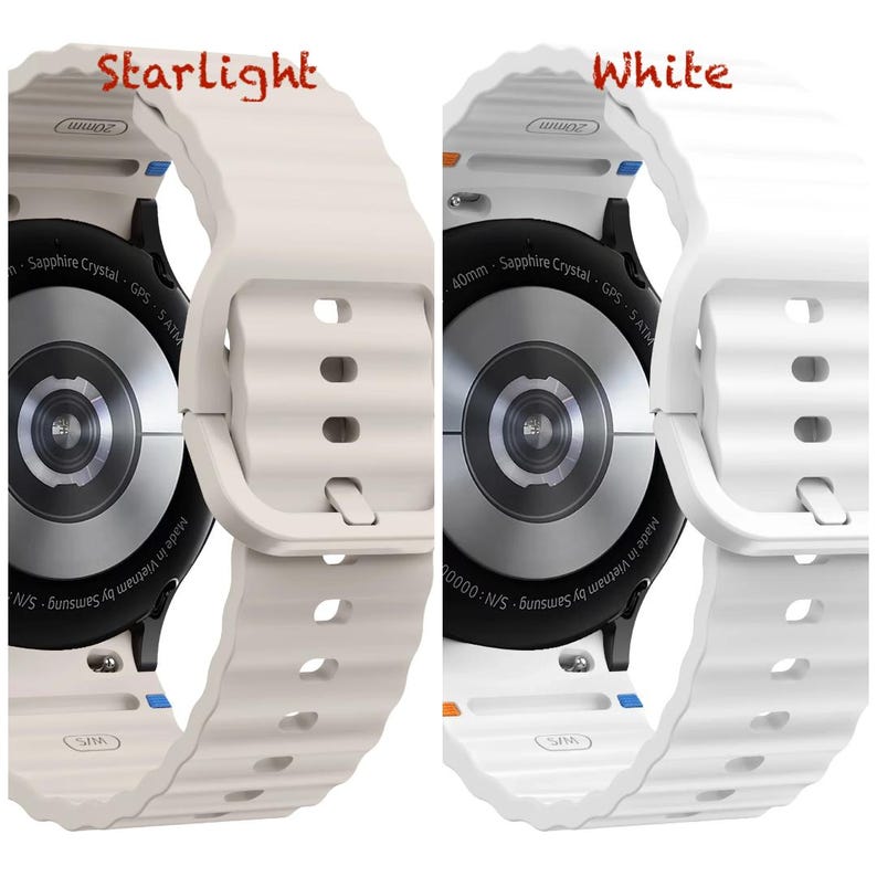 May include: Two smartwatches are shown, one with an off-white strap labelled "Starlight" and the other with a white strap labelled "White". Both watches have a black circular face with text that reads "Sapphire Crystal GPS - 5 ATM".