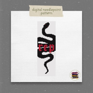 May include: Digital needlepoint pattern featuring a black snake design with the word "rep" in red. The snake is stylized and wraps around the text. The background is white, and the overall aesthetic is a modern, graphic style.