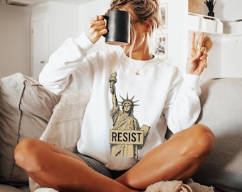 Wiederstands-Shirt: Freies feministisches Anti-Trumpf-T-Shirt