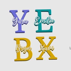 May include: Four colorful wooden letters: Y, E, B, and X. Each letter has a name written in cursive. The letter Y is purple with "Yara" in white. The letter E is teal with "Emilie" in white.