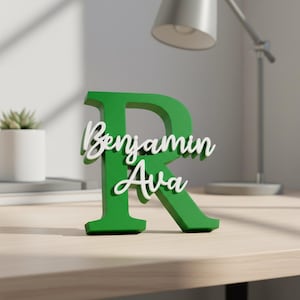 May include: A rustic wooden sign with the text "Welcome to our home" in white lettering. The sign features a distressed finish and a simple, inviting design, perfect for entryway decor.