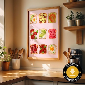 Puede incluir: Una impresión enmarcada con nueve ilustraciones de tostadas con varios ingredientes, incluyendo aguacate, huevos y fruta. La obra de arte está sobre un fondo rosa claro, dentro de un marco de madera. La imagen está en un entorno de cocina.