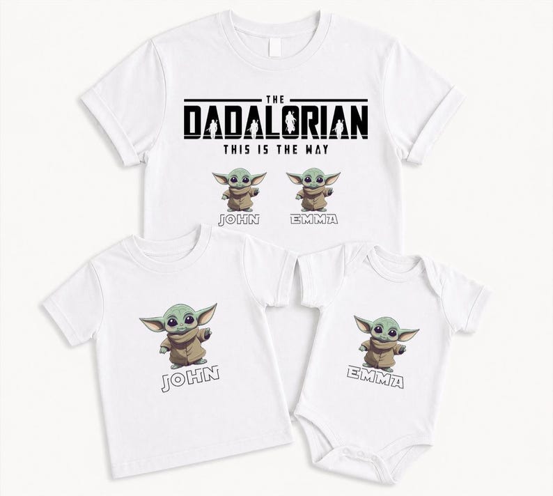 May include: White t-shirts and a babygrow featuring a cartoon character. The shirts have the text "THE DADALORIAN THIS IS THE WAY" and the character's image. One shirt says "JOHN" and the babygrow says "EMMA".