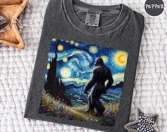 Comfort Colors® Bigfoot Starry Night T-Shirt, Sasquatch Nature Art Tee, Retro Forest Cryptid T-Shirt, Retro Camping Hiking Outdoorsy Shirt