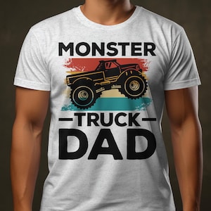 a man wearing a monster truck dad t - shirt