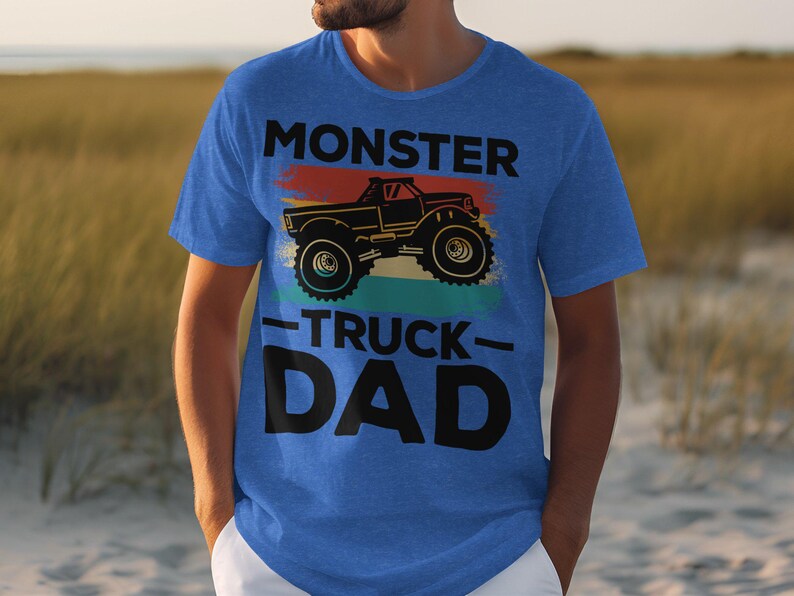 a man wearing a monster truck dad t - shirt