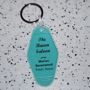 The Raven Saloon Marion Ravenwood Indiana Jones Movie Inspired Keychain Tag