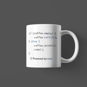May include: White ceramic coffee mug with a black and blue code snippet printed on the side. The code reads "if (coffee.empty) { coffee.refill(); } else { coffee.drink(); code(); }" and is followed by "// Powered by: Ryan".