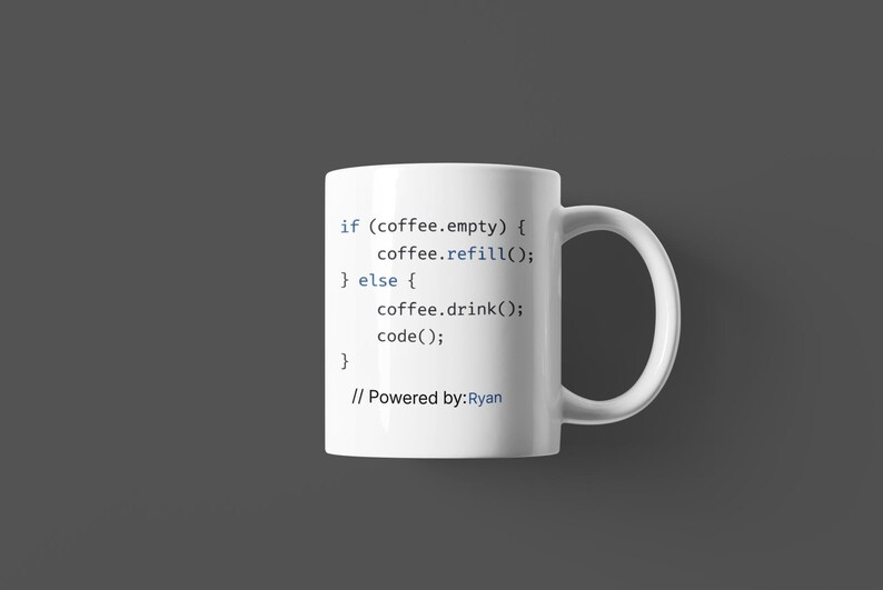 May include: White ceramic coffee mug with a black and blue code snippet printed on the side. The code reads "if (coffee.empty) { coffee.refill(); } else { coffee.drink(); code(); }" and is followed by "// Powered by: Ryan".